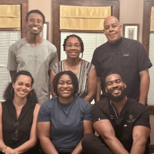 How to serve your community sustainably - NWHSU students visiting Dr. Juneau Robbins at his North Minneapolis clinic