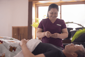 Dr. Tran treating a patient 